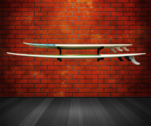 Wall mounted surfboard racks powder coated black to hold 2 mals